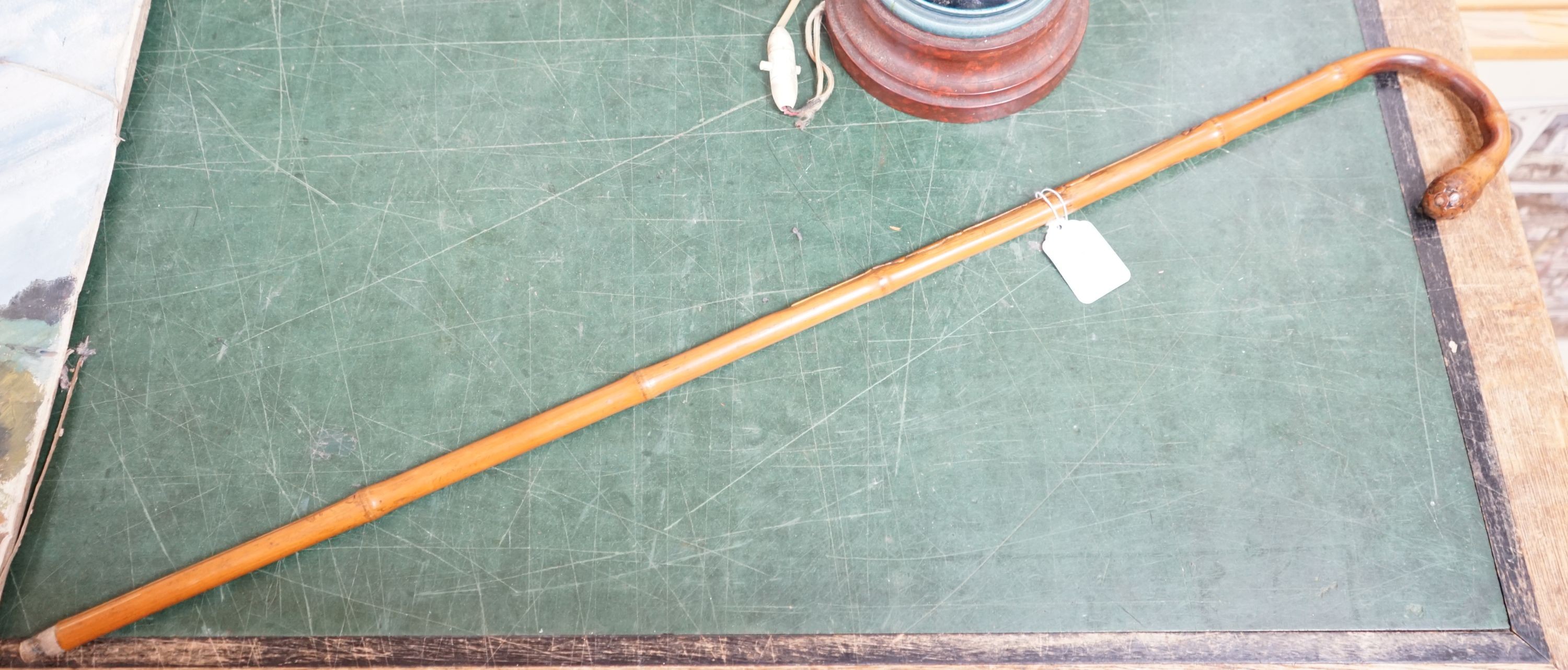 A Japanese bamboo 'monkey' walking cane, Meiji period 90cm